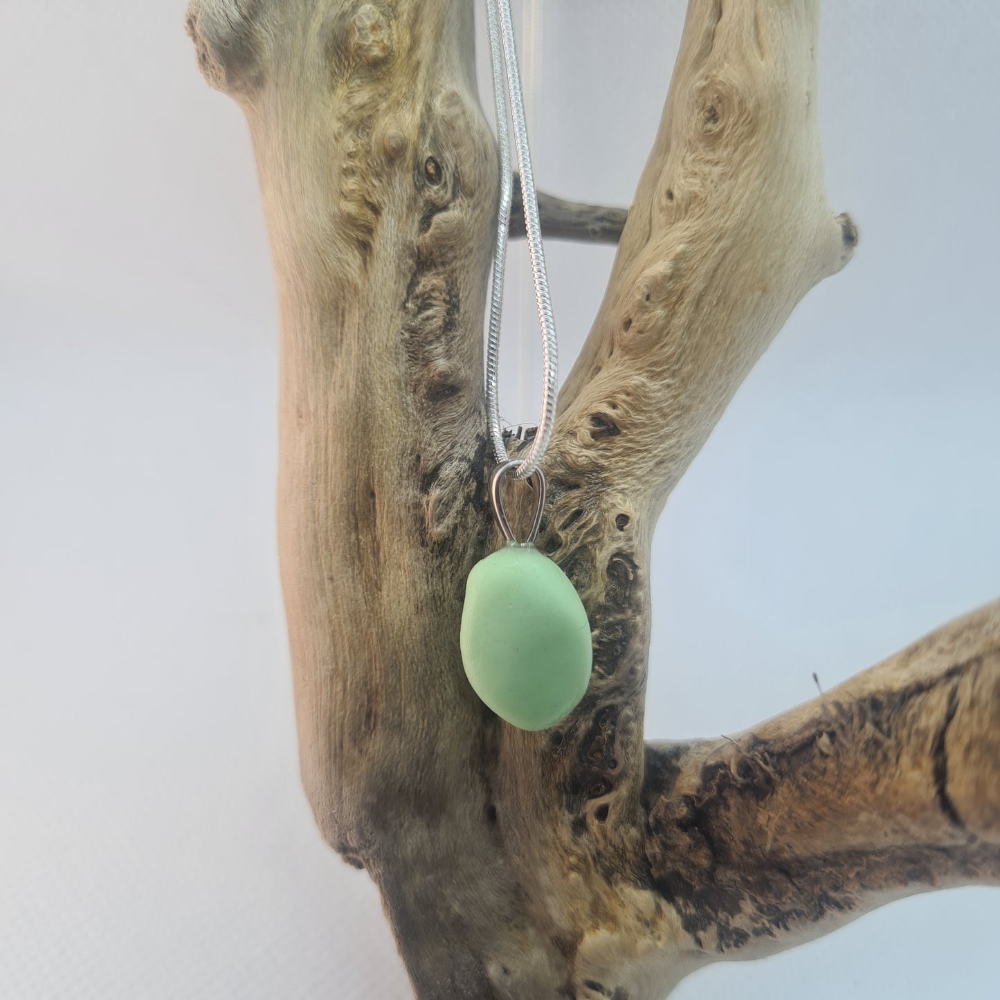 Rare pastel green milk glass pendant